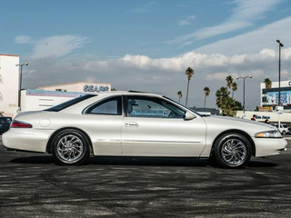 Illustration for article titled Used Car Face-Off: International Touring Coupes Edition